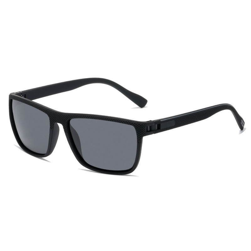 Black sunglasses with dark lenses on a white background