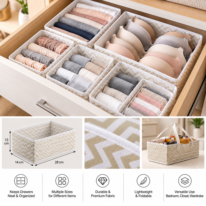 Foldable fabric drawer organizers with chevron design, holding folded clothes inside a drawer