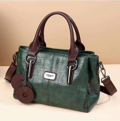 Retro classic large-capacity handbag in dark green with two top handles and crossbody strap