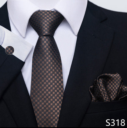 Brown checkered tie and pocket square set with black suit and white shirt