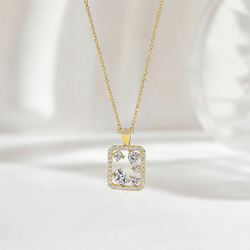 S925 sterling silver geometric rectangle necklace featuring mixed-cut D Color VVS1 moissanite stones with pave halo border in silver and gold finishes