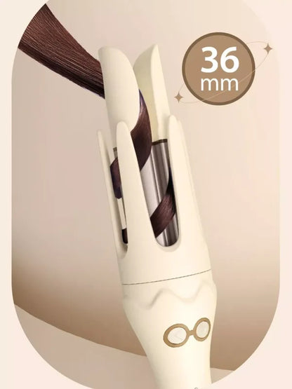 Beige ceramic curling iron with 36 mm barrel size label and rotating clip