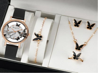 Jewelry set with watch, necklace, and earrings featuring butterfly designs.