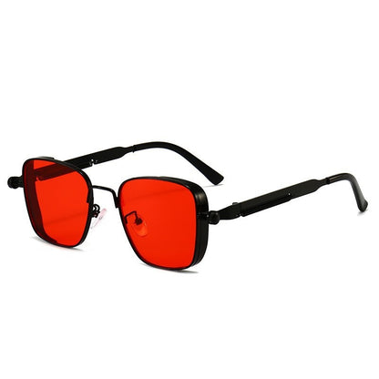 Sunglasses with red lenses and black frames on a white background