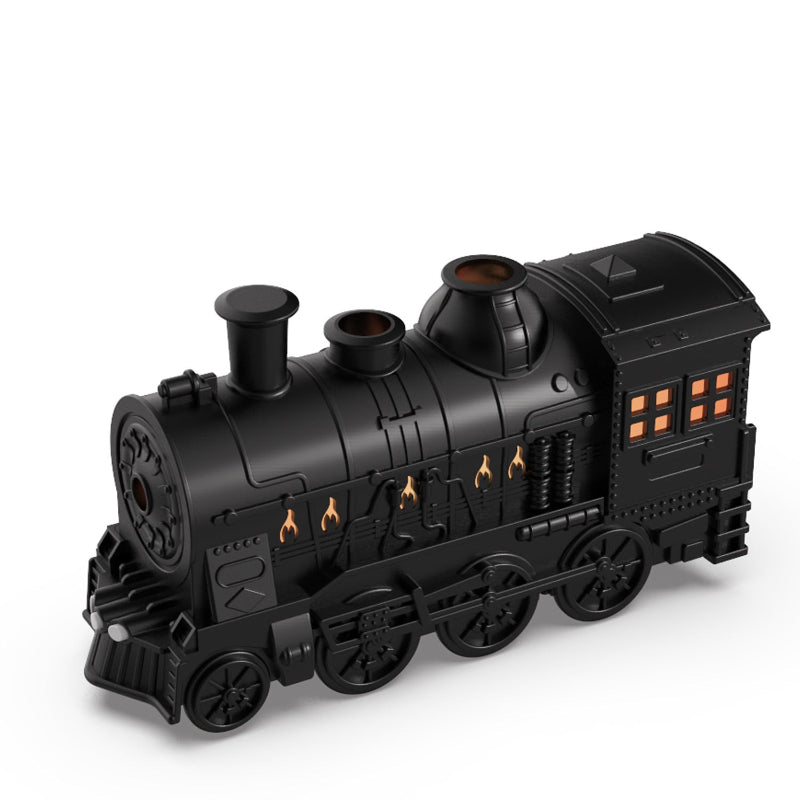 Black toy train engine on a white background