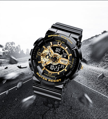 Black and gold sports watch with digital and analog display on a road background