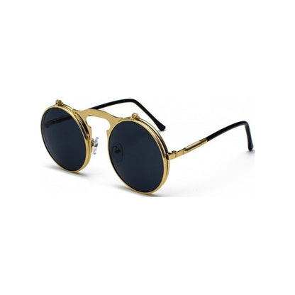 Round sunglasses with gold frame and black lenses on a white background