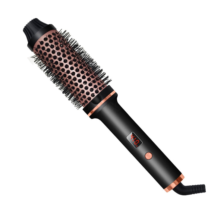 Hair styling tool with bristle brush head and digital display on a white background