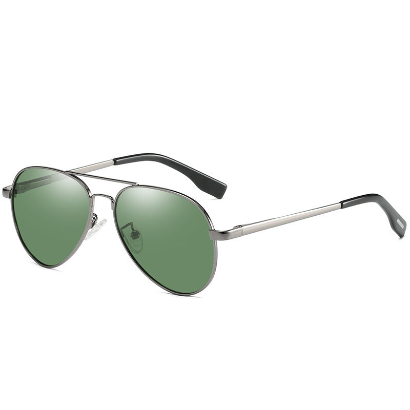 Aviator sunglasses with green lenses on a white background