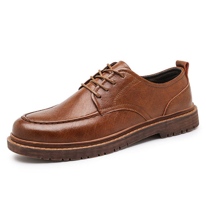 Brown leather shoe on a white background