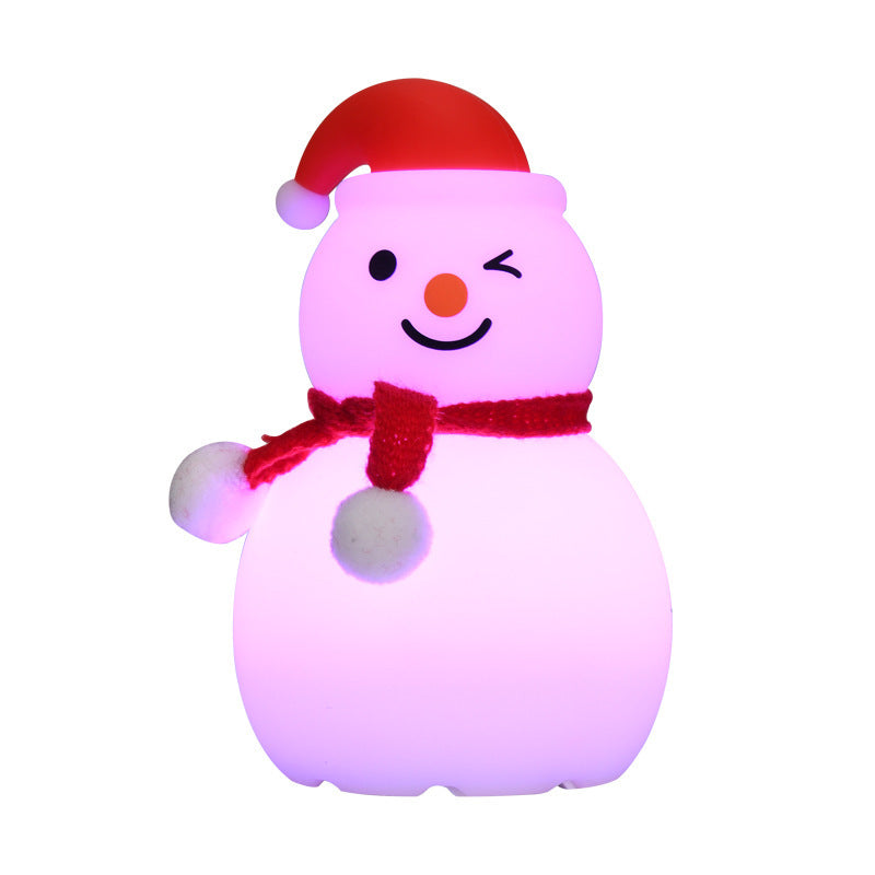 Colorful snowman-shaped toy with a red hat and scarf on a white background