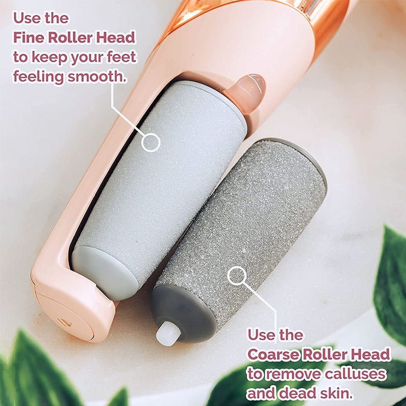 Close-up of pink electric foot file with fine and coarse roller heads
