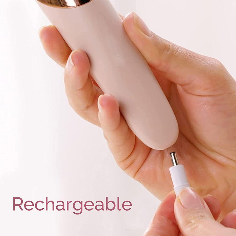 Charging cable being connected to the base of the pink electric foot file