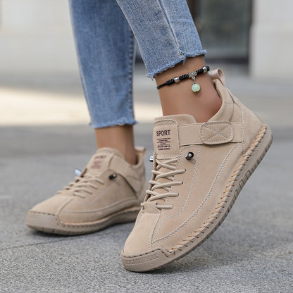 Men's mid-top lace-up leather shoe in beige with strap accents and grippy outsole.