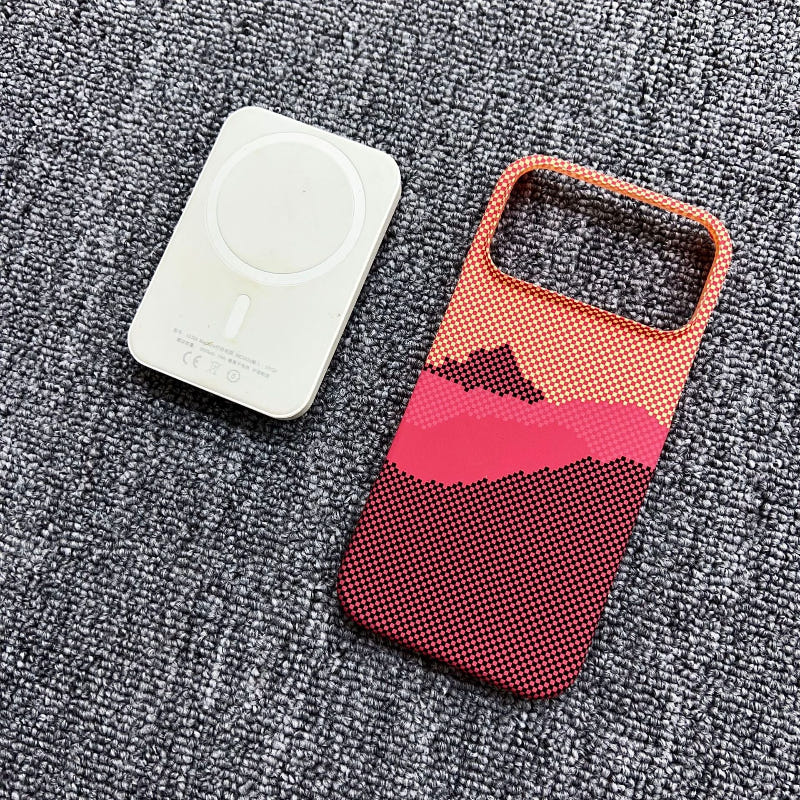 Magnetic iPhone case with red-to-coral gradient pattern and camera cutout, plus white magnetic plate