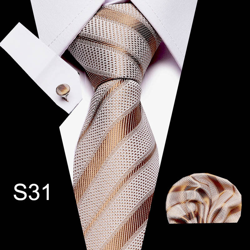 Striped tie with matching pocket square on a black background