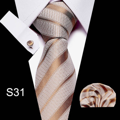Striped tie with matching pocket square on a black background