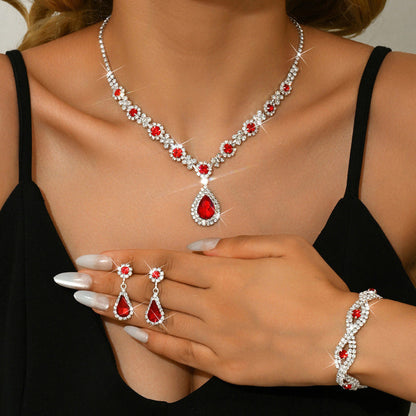 Silver and red crystal teardrop bridal jewelry set with necklace, earrings, bracelet