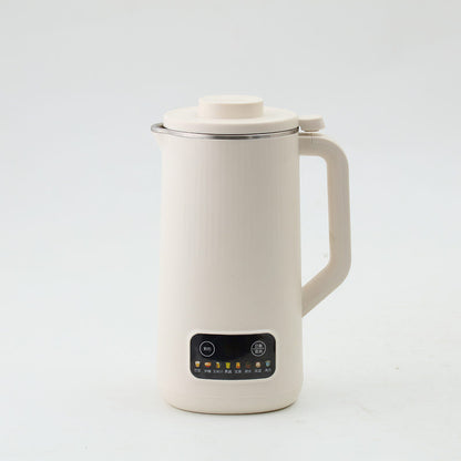 White electric soy milk maker with lid, handle, and front control panel