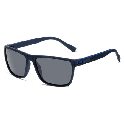 Sunglasses with blue frame and dark lenses on a white background