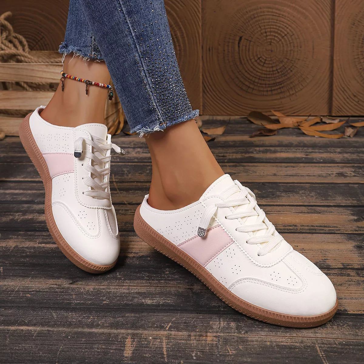 White round-toe sneakers with pink panel, lace-up front, gum sole
