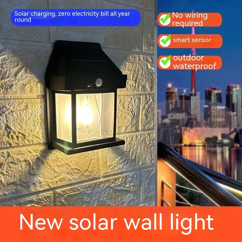 Solar wall light on a stone wall with cityscape background