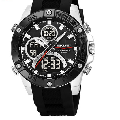 Black and silver digital watch with a white background