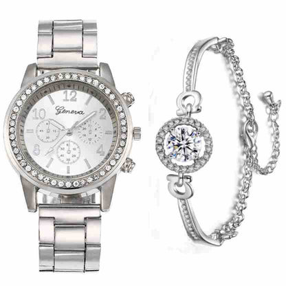 Silver watch and bracelet set on a white background