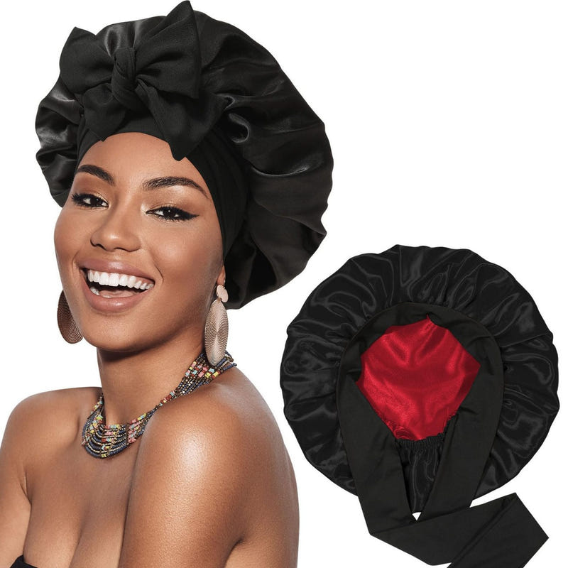 Satin ribbon round cap in black satin, heart accent on the side and bow