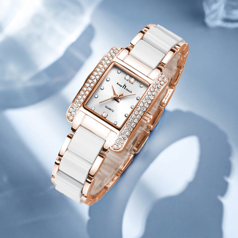 Luxury women’s quartz square watch with white strap and diamonds