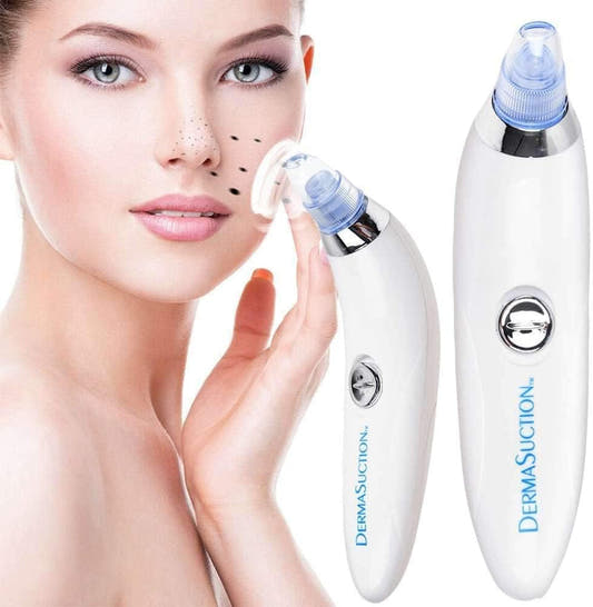 White handheld pore cleaning device with blue suction tip and textured metal detailing
