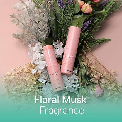 KAHI pink balm stick tubes with floral musk theme, shown with bundled flowers