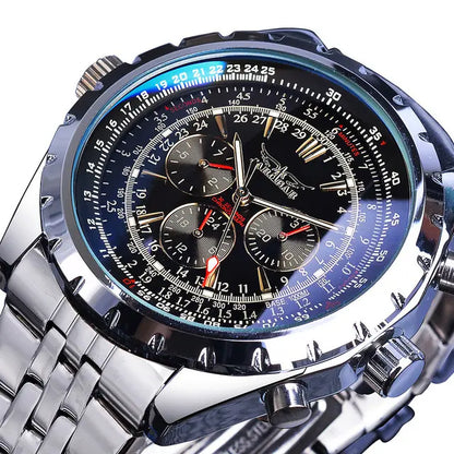 Blue-accent chronograph watch with black dial, silver link bracelet, stainless steel case