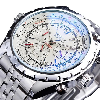 White dial chronograph watch with blue accents, silver link bracelet, round stainless steel case